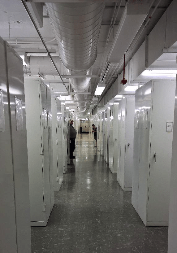 These compactors are how you store seven football fields worth of organisms in only a few floors worth of space.Each compactor weighs 25,000lbs. 