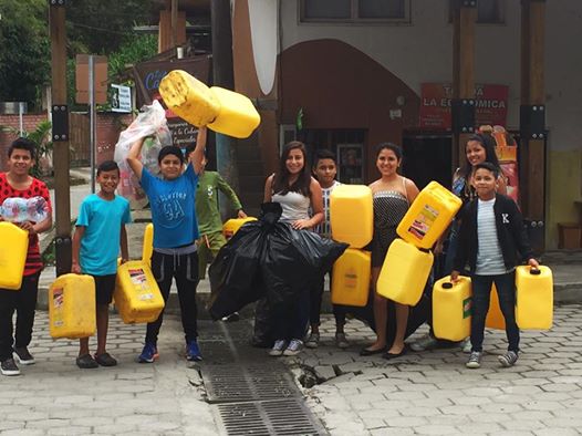 Kids are bringing drinkable water to affected areas. 